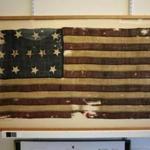The oldest 13-stars-and-stripes American flag available for public view is at the Commonwealth Museum.